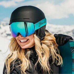 Women’s Blenders Chip MIPS helmet and Aura googles with extra lense.